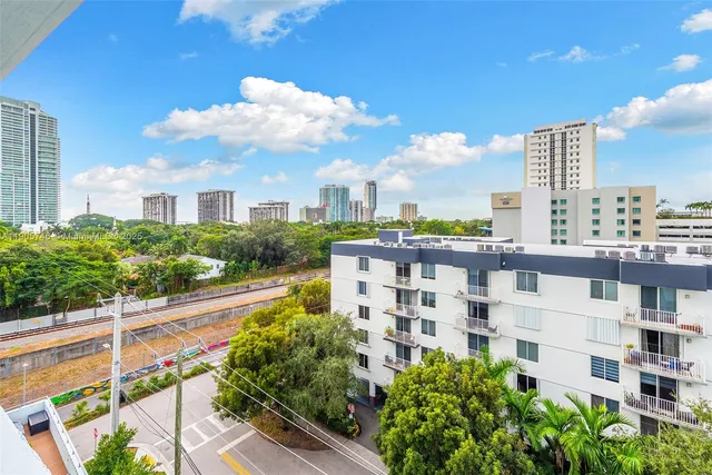 a view of a city with tall buildings