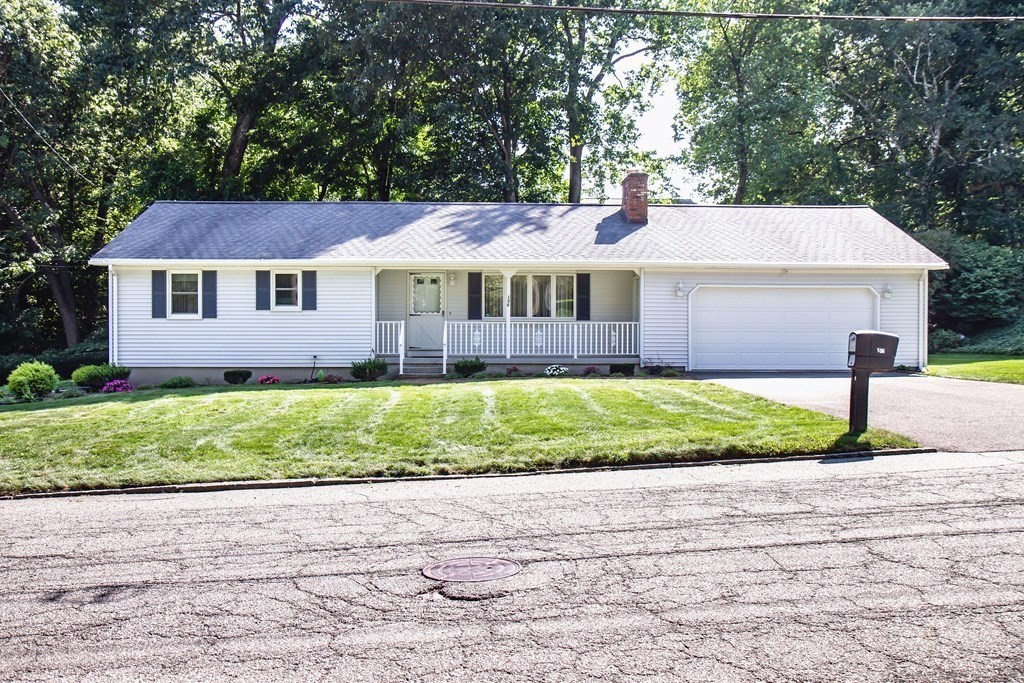 106 Lawrence Road Chicopee, MA 01013 - Photo 1 of 39 a front view of a house with a yard