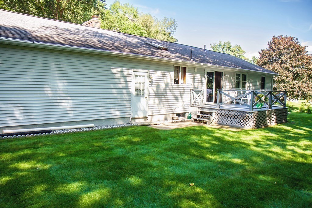 106 Lawrence Road Chicopee, MA 01013 - Photo 11 of 39 a front view of a house with a yard