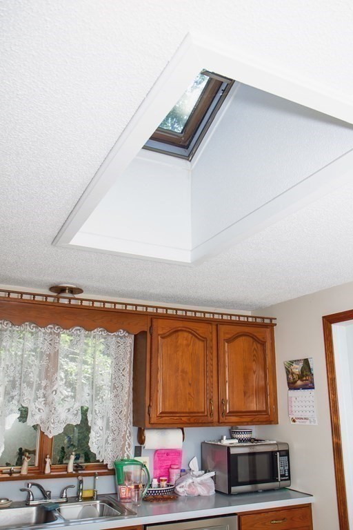 106 Lawrence Road Chicopee, MA 01013 - Photo 22 of 39 a view of a living room and floor to ceiling window