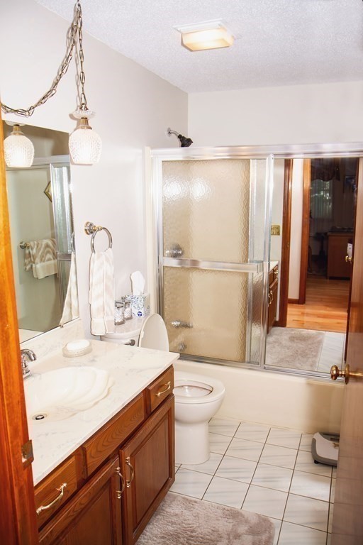 106 Lawrence Road Chicopee, MA 01013 - Photo 24 of 39 a bathroom with a sink a toilet and shower