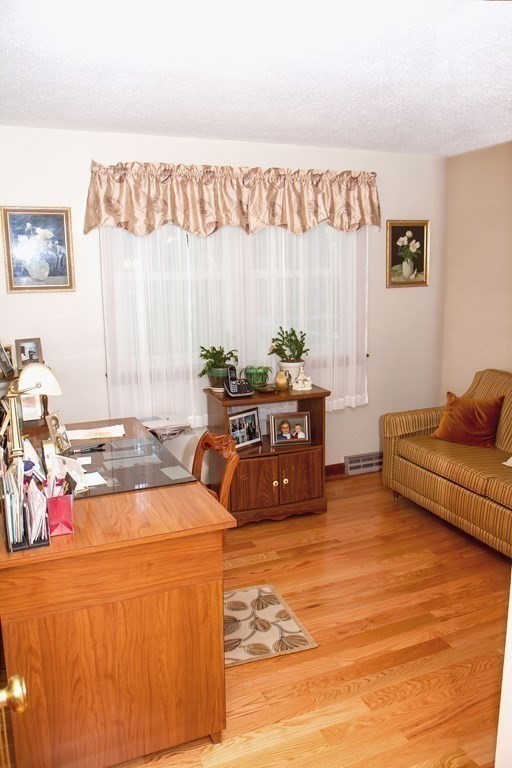 106 Lawrence Road Chicopee, MA 01013 - Photo 26 of 39 a living room with furniture and a large window