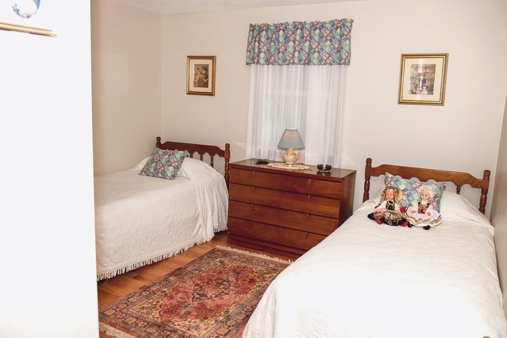 106 Lawrence Road Chicopee, MA 01013 - Photo 27 of 39 a bedroom with a bed and a window