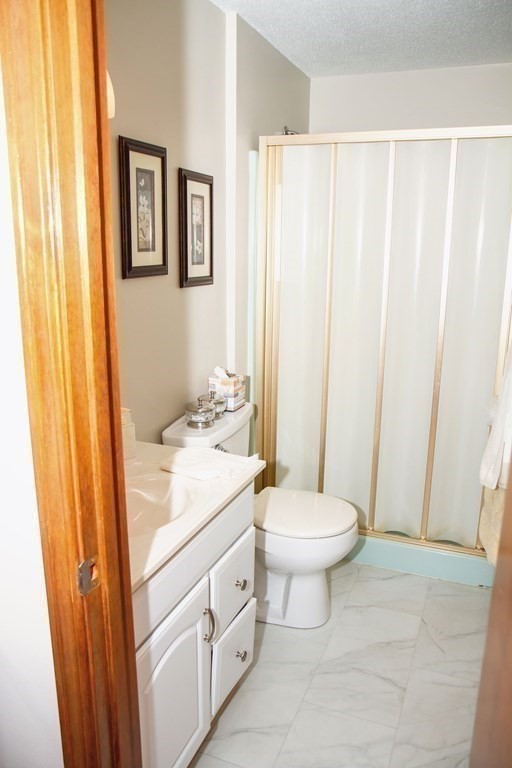 106 Lawrence Road Chicopee, MA 01013 - Photo 32 of 39 a bathroom with a sink toilet and shower