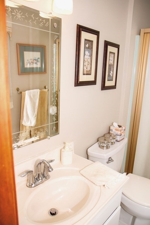 106 Lawrence Road Chicopee, MA 01013 - Photo 33 of 39 a bathroom with a sink and a mirror