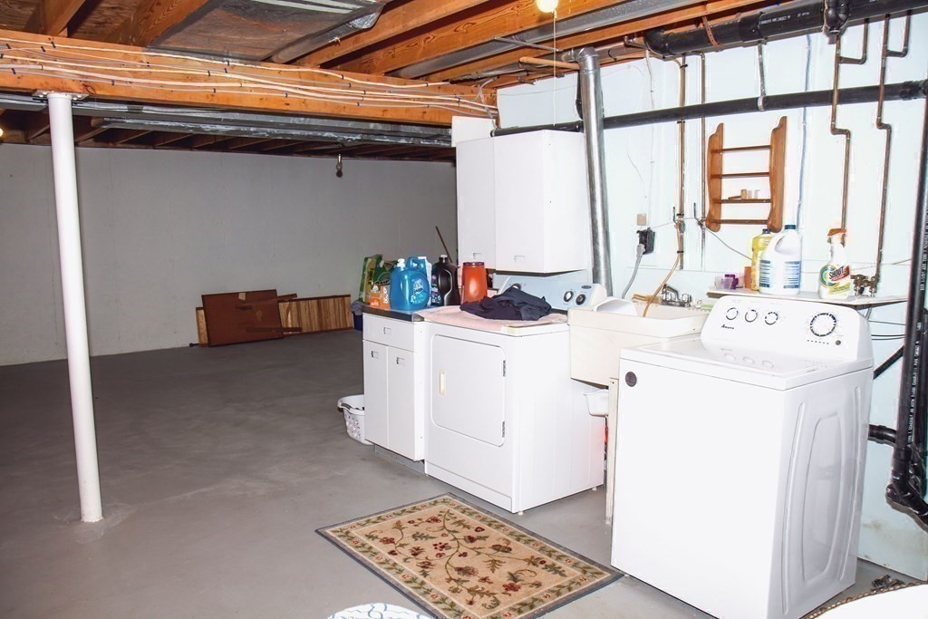 106 Lawrence Road Chicopee, MA 01013 - Photo 35 of 39 a utility room with dryer and washer