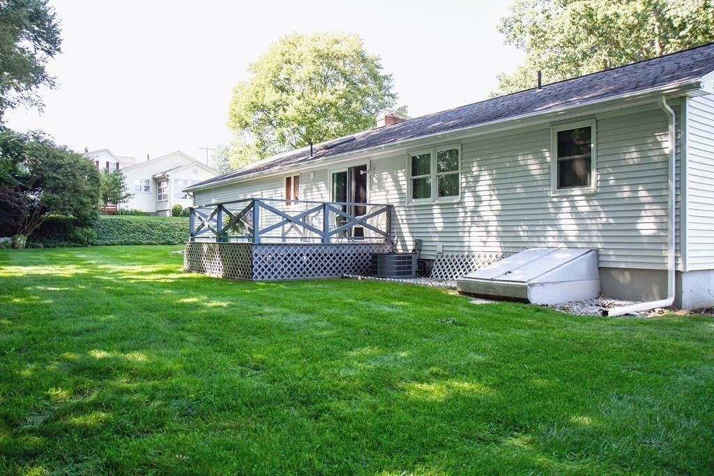 106 Lawrence Road Chicopee, MA 01013 - Photo 8 of 39 a front view of house with yard and outdoor seating