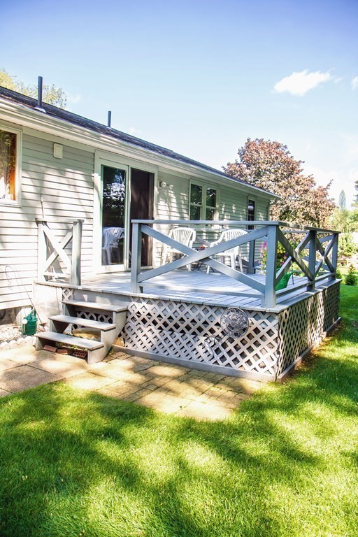 106 Lawrence Road Chicopee, MA 01013 - Photo 10 of 39 a front view of a house with a yard