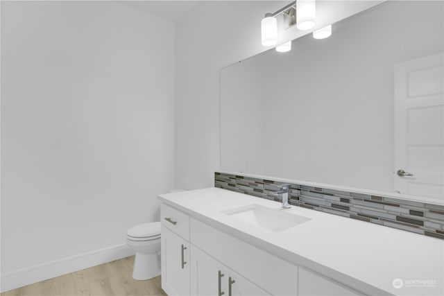 a bathroom with a sink and a toilet