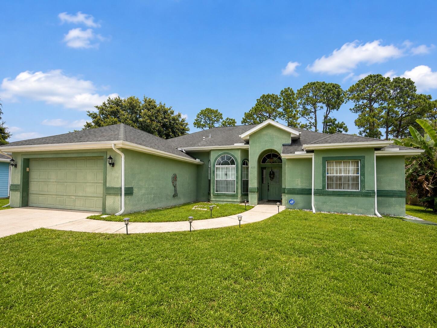 609 Southwest Jada Road Port St. Lucie, FL 34953 - Photo 2 of 29 Front of Structure