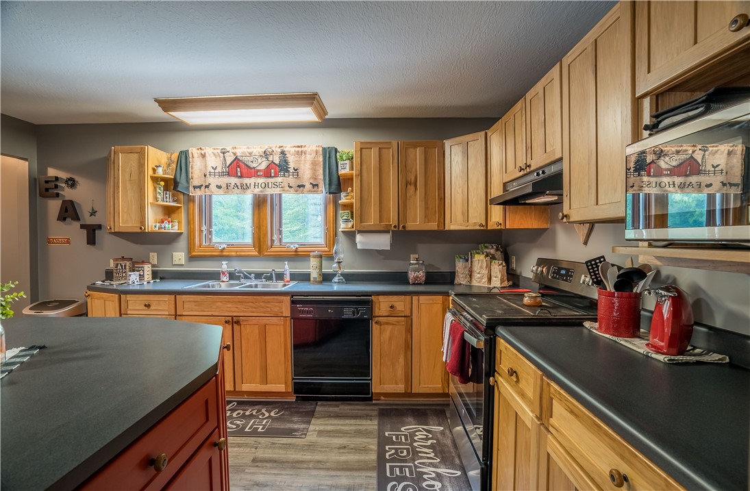 1319 Perry Road Cable, OH 43009 - Photo 14 of 44 This functional kitchen features ample cabinetry and a practical layout for daily living.