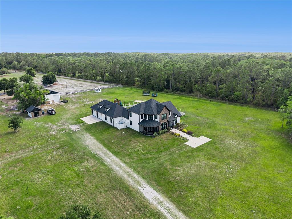 345 Cypress Isles Road Osteen, FL 32764 - Photo 5 of 41 a view of a garden with mountain