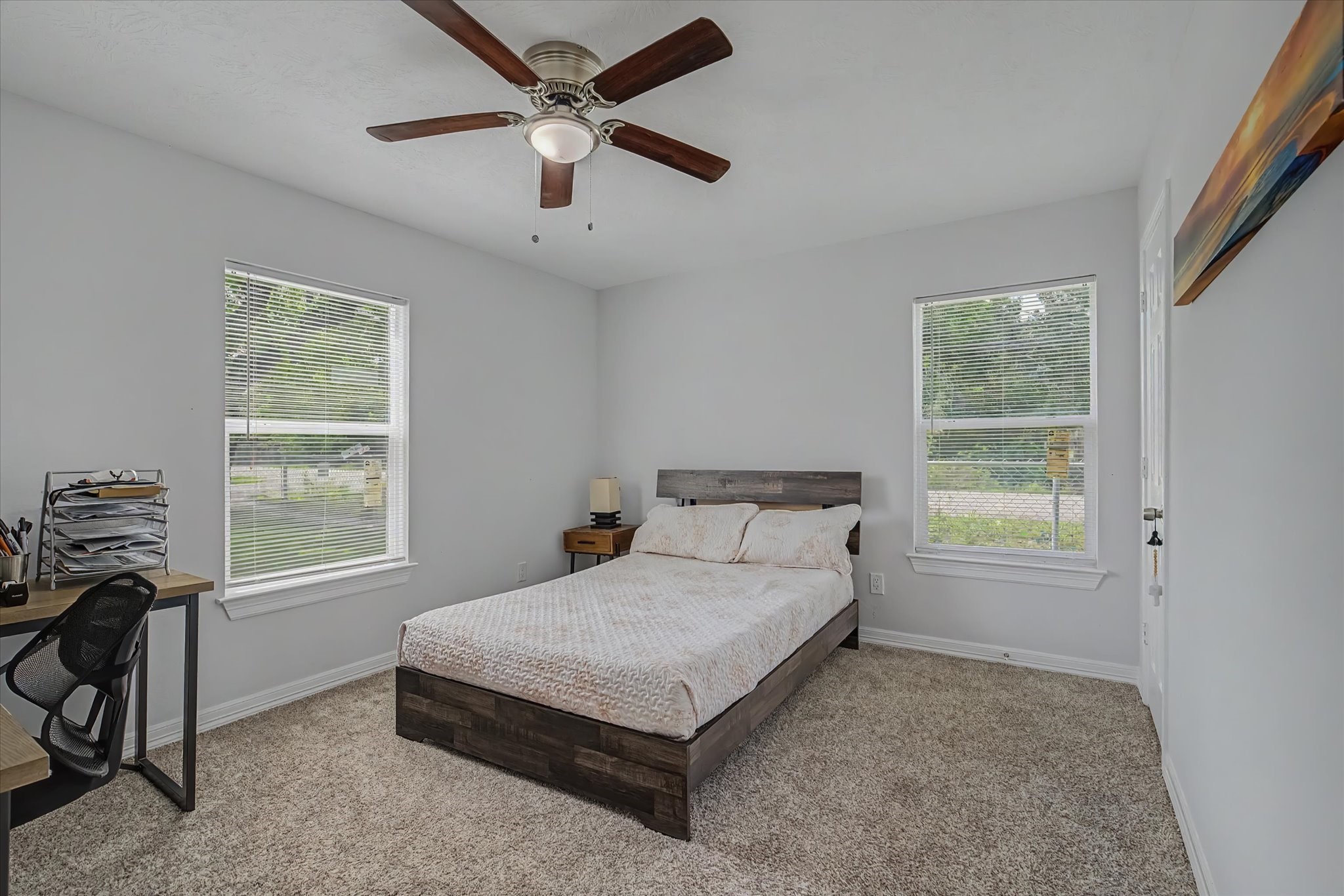 6834 New York Street Houston, TX 77021 - Photo 24 of 39 Bright secondary bedroom featuring a large window for great natural light and a spacious closet