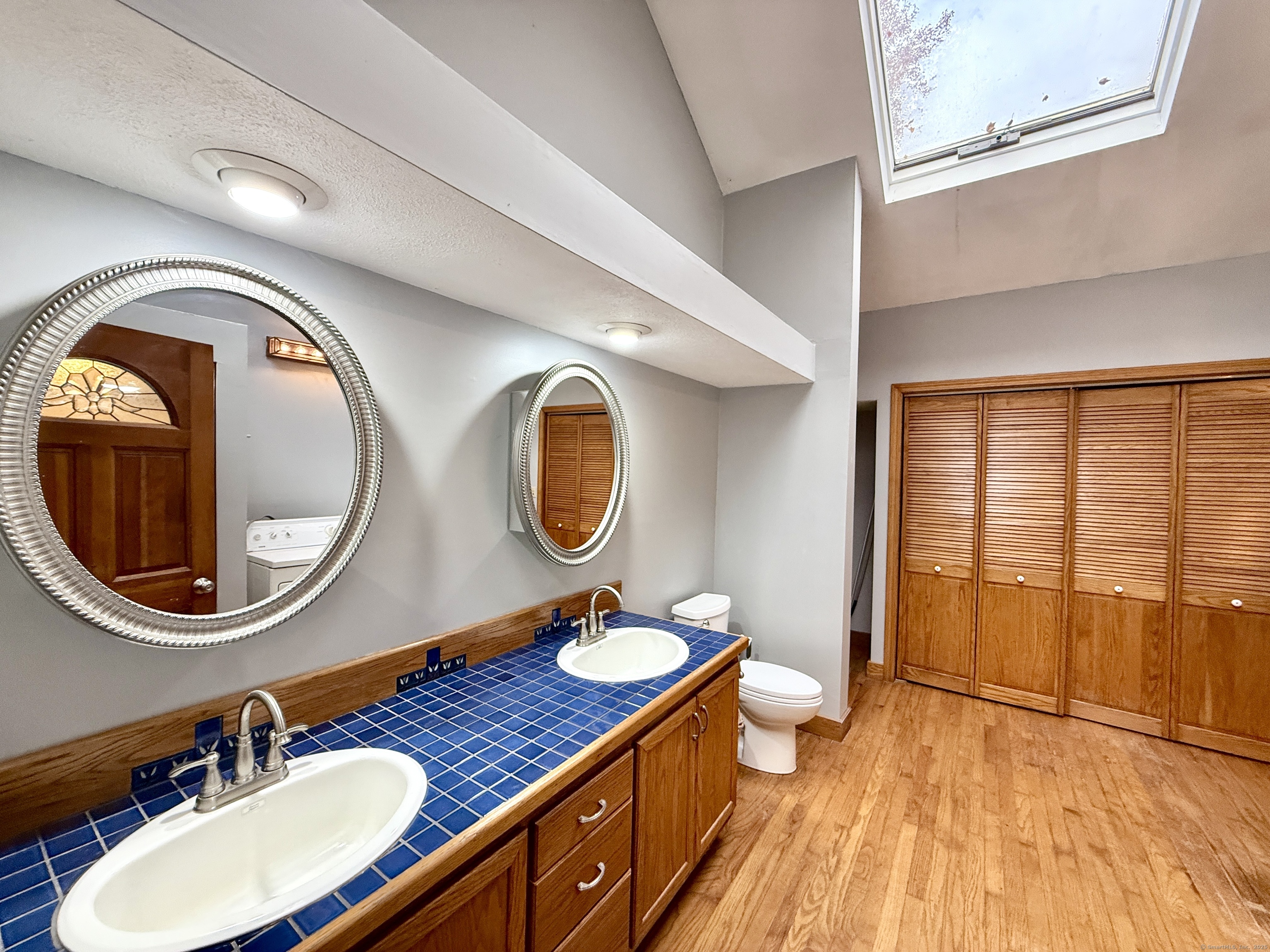 102 Krapf Road Ashford, CT 06278 - Photo 14 of 39 a bathroom with a granite countertop double vanity sink and a mirror