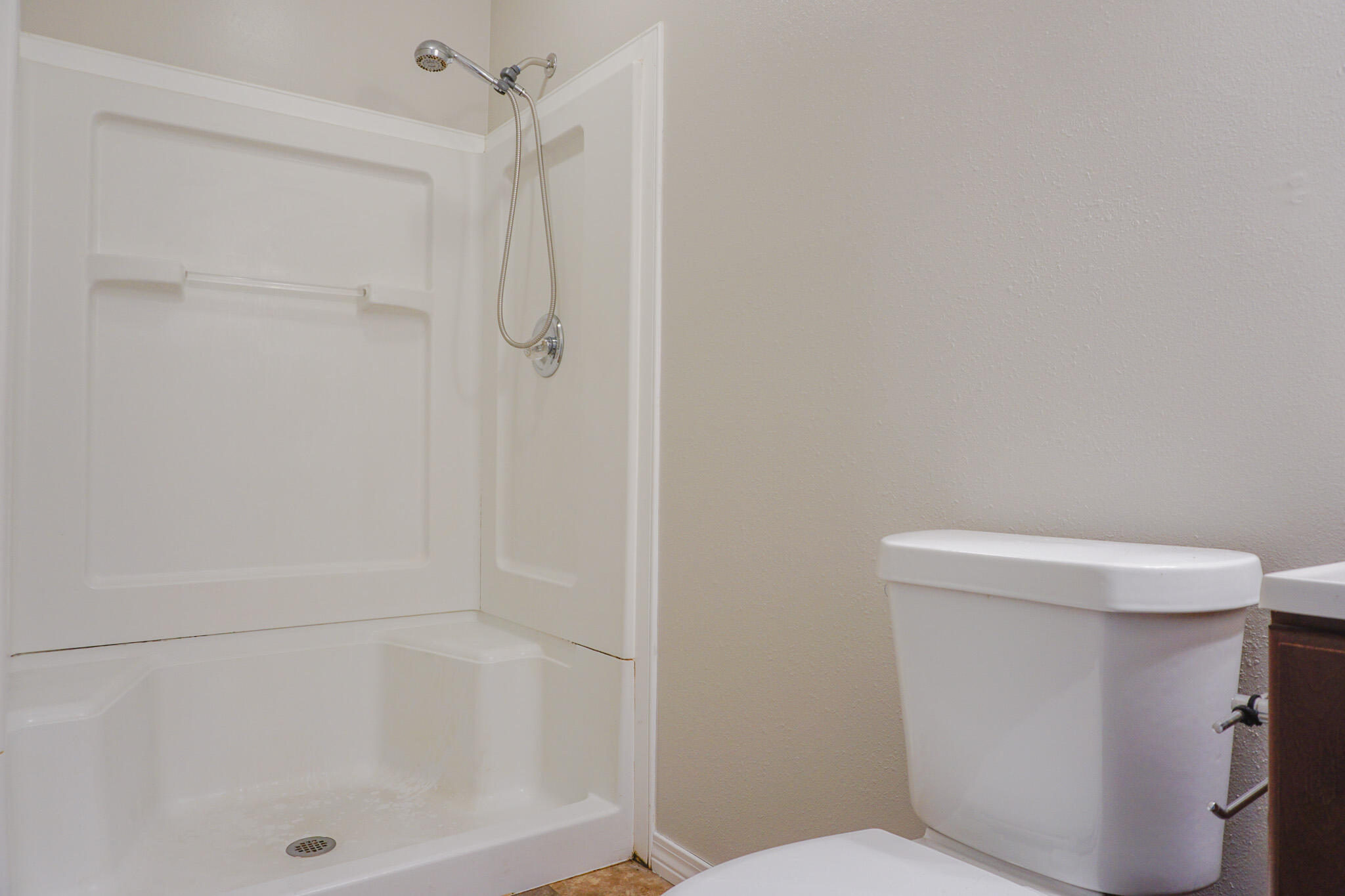 6115 Willow Lane North Crestview, FL 32539 - Photo 13 of 29 a bathroom with a shower and a toilet