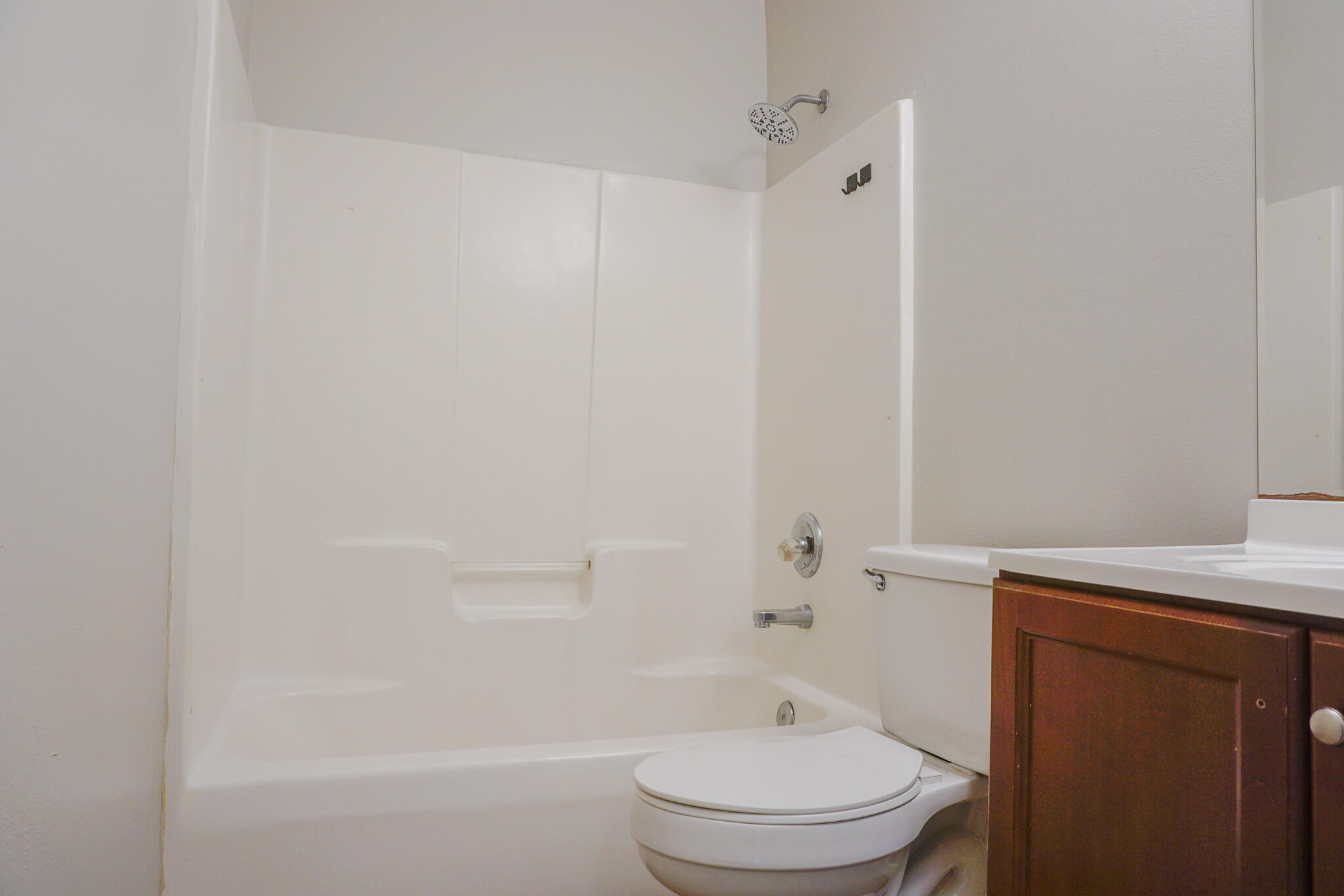 6115 Willow Lane North Crestview, FL 32539 - Photo 22 of 29 a bathroom with a toilet and a shower