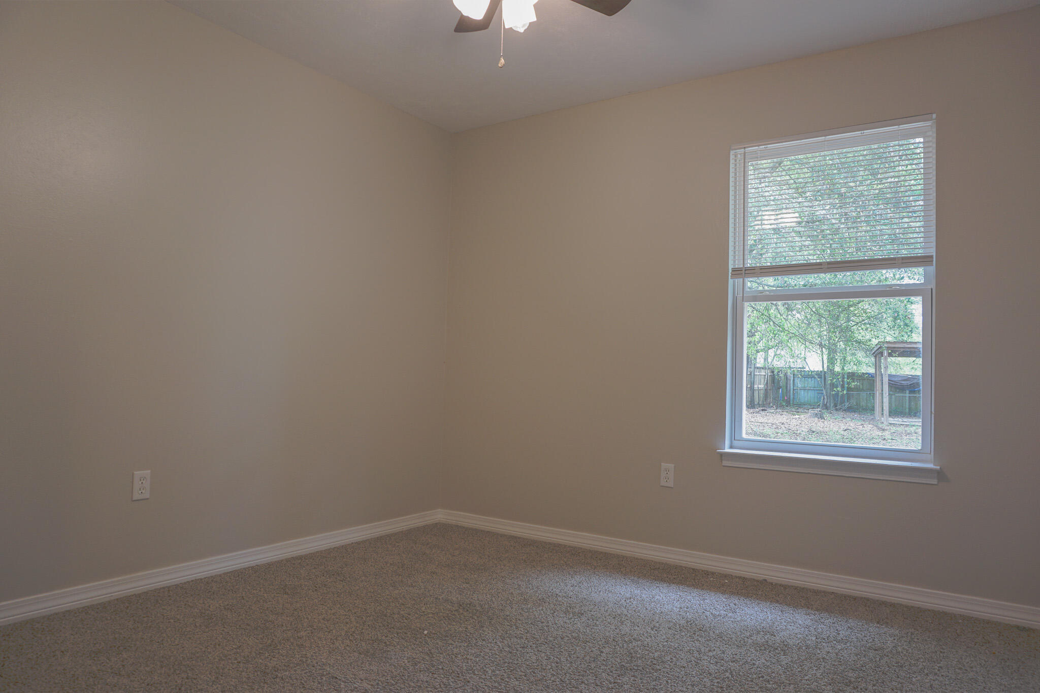6115 Willow Lane North Crestview, FL 32539 - Photo 23 of 29 an empty room with a window