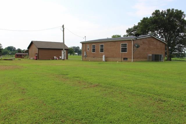 5363 Dowlen Road Cedar Hill, TN 37032 - Photo 8 of 20 View of back side of home and garage.