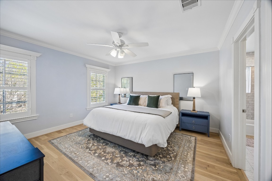 1741 Banks Street Houston, TX 77098 - Photo 13 of 31 a bedroom with bed and a window