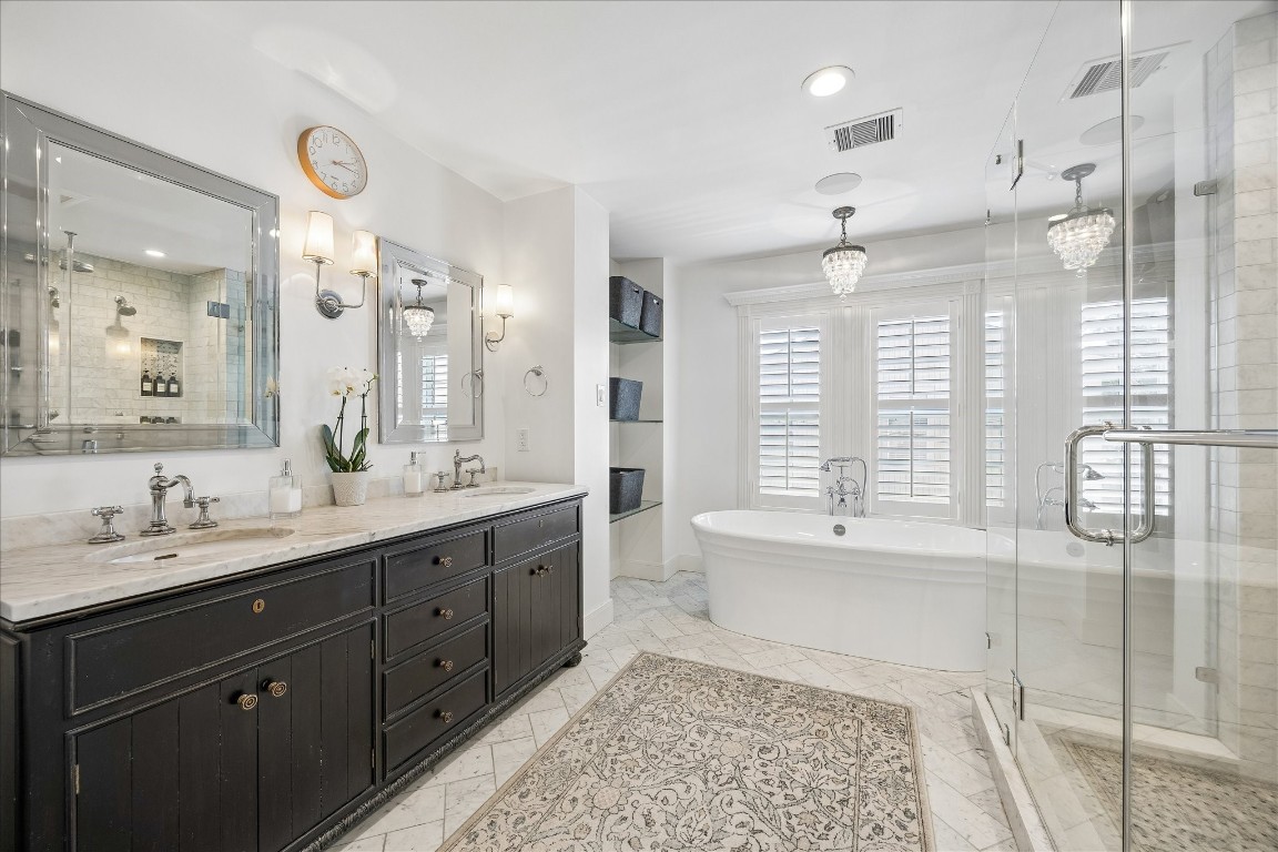 1741 Banks Street Houston, TX 77098 - Photo 21 of 31 a spacious bathroom with a double vanity sink mirror and double