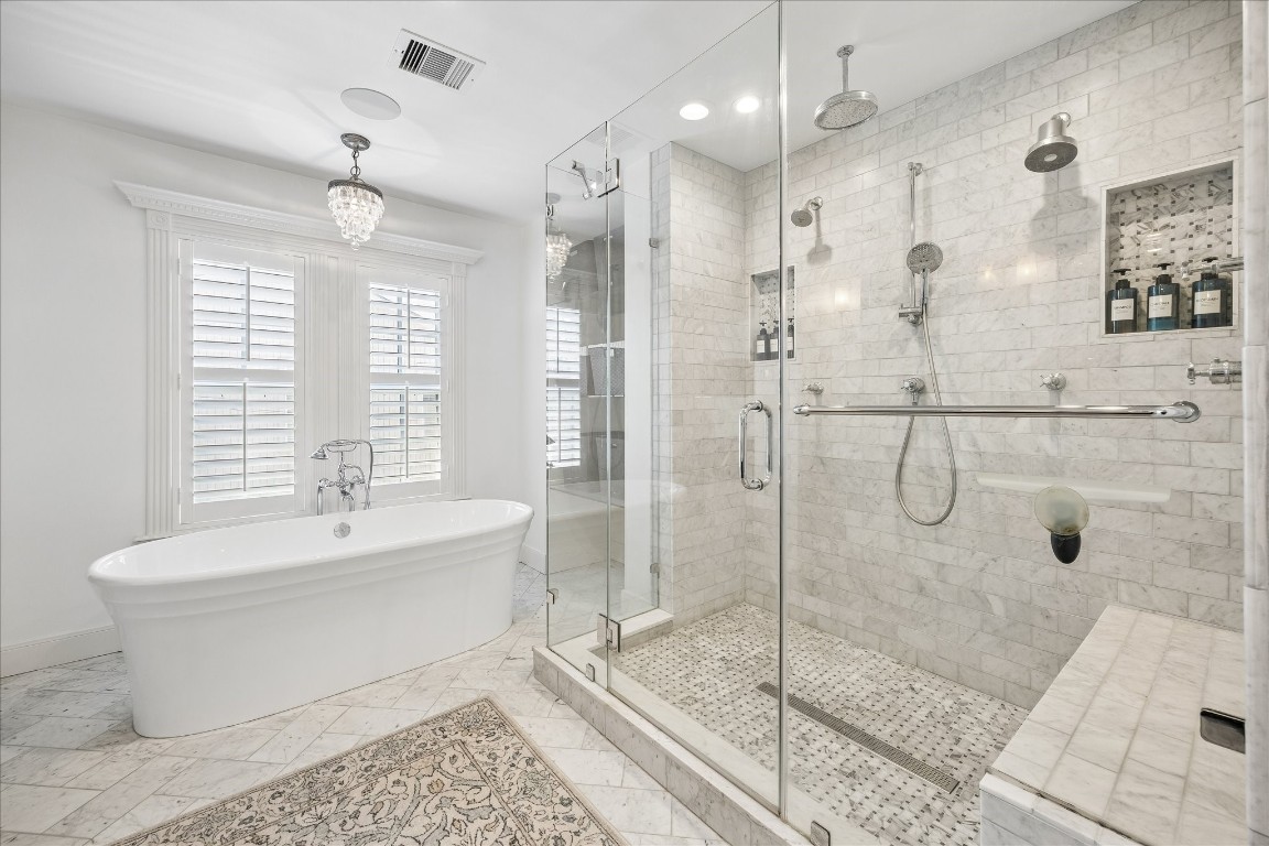 1741 Banks Street Houston, TX 77098 - Photo 22 of 31 a bathroom with a bathtub and a shower