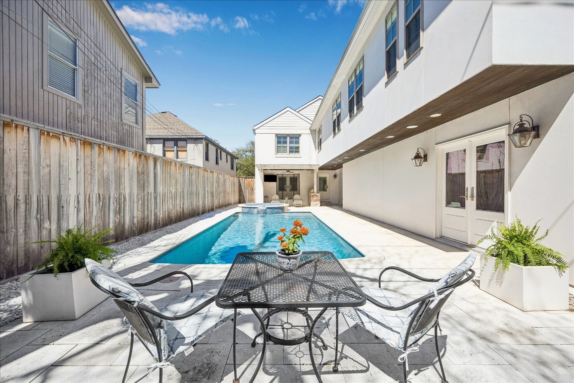 1741 Banks Street Houston, TX 77098 - Photo 27 of 31 a view of swimming pool with outdoor seating and stairs