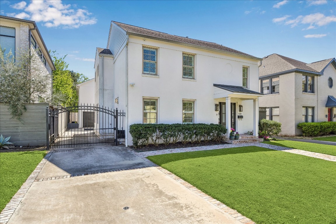 1741 Banks Street Houston, TX 77098 - Photo 31 of 31 a front view of a house with a yard