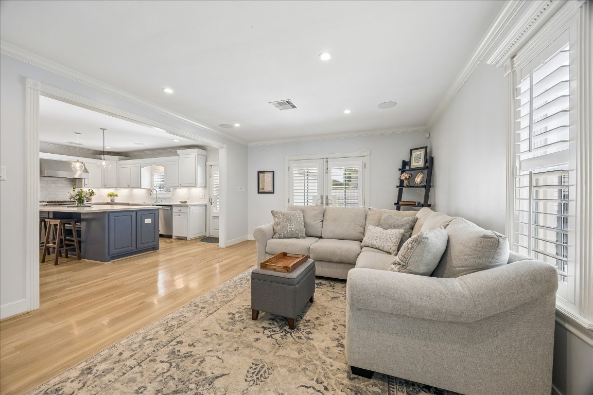 1741 Banks Street Houston, TX 77098 - Photo 6 of 31 a living room with furniture and view of kitchen