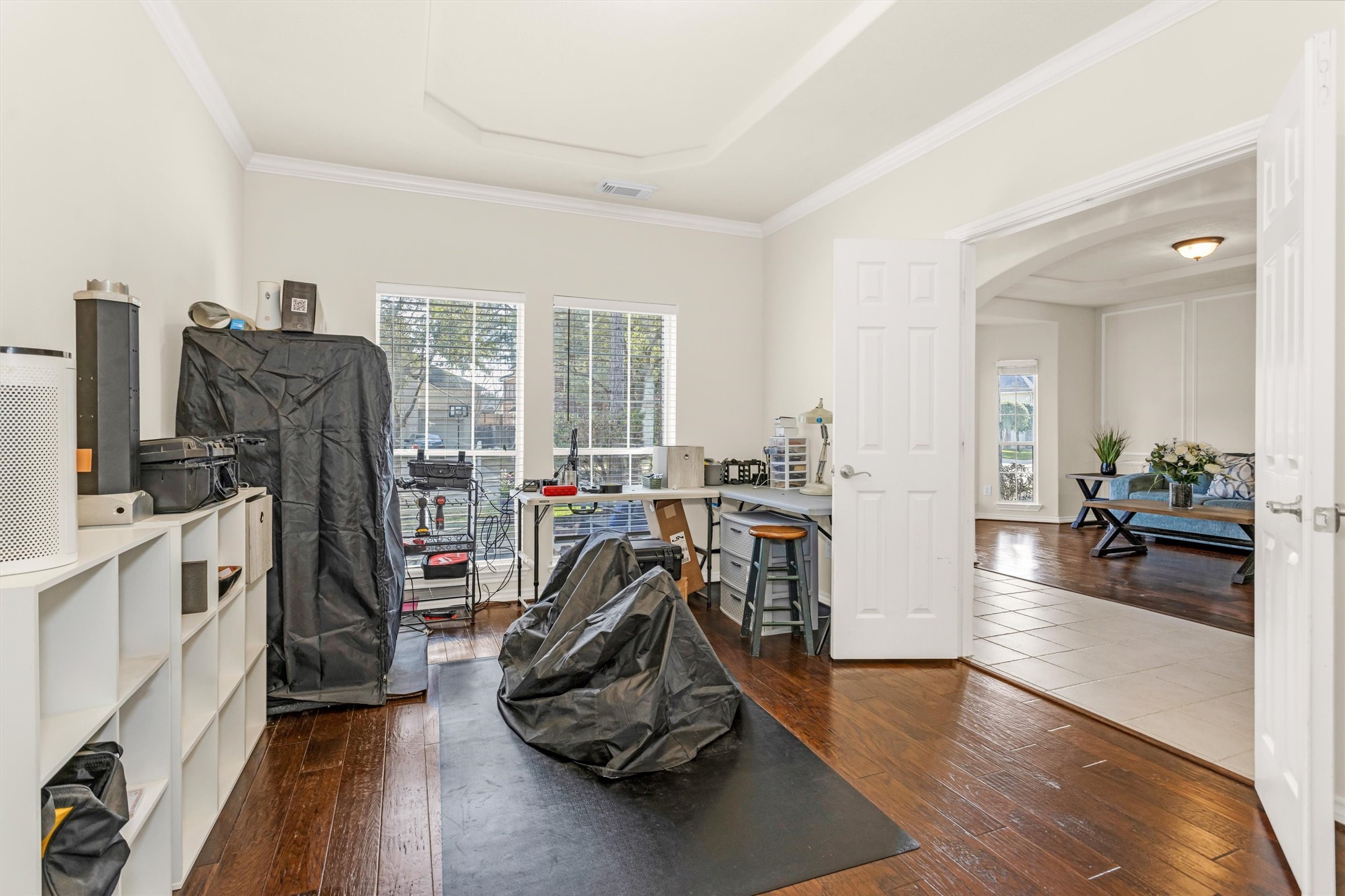 3211 Burton Ridge Drive Spring, TX 77386 - Photo 11 of 49 a view of a livingroom with furniture hardwood floor and a flat screen tv