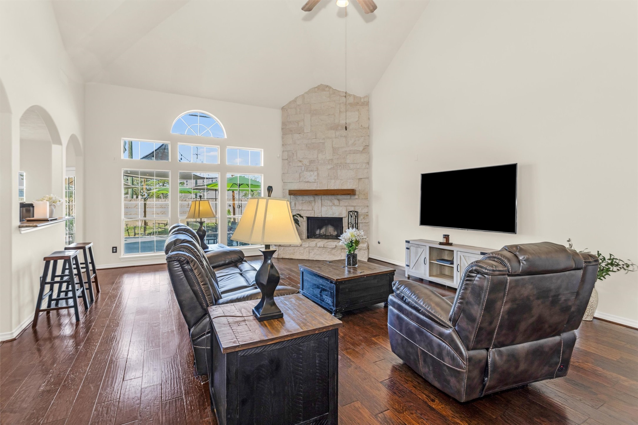 3211 Burton Ridge Drive Spring, TX 77386 - Photo 13 of 49 a living room with furniture fireplace and a flat screen tv