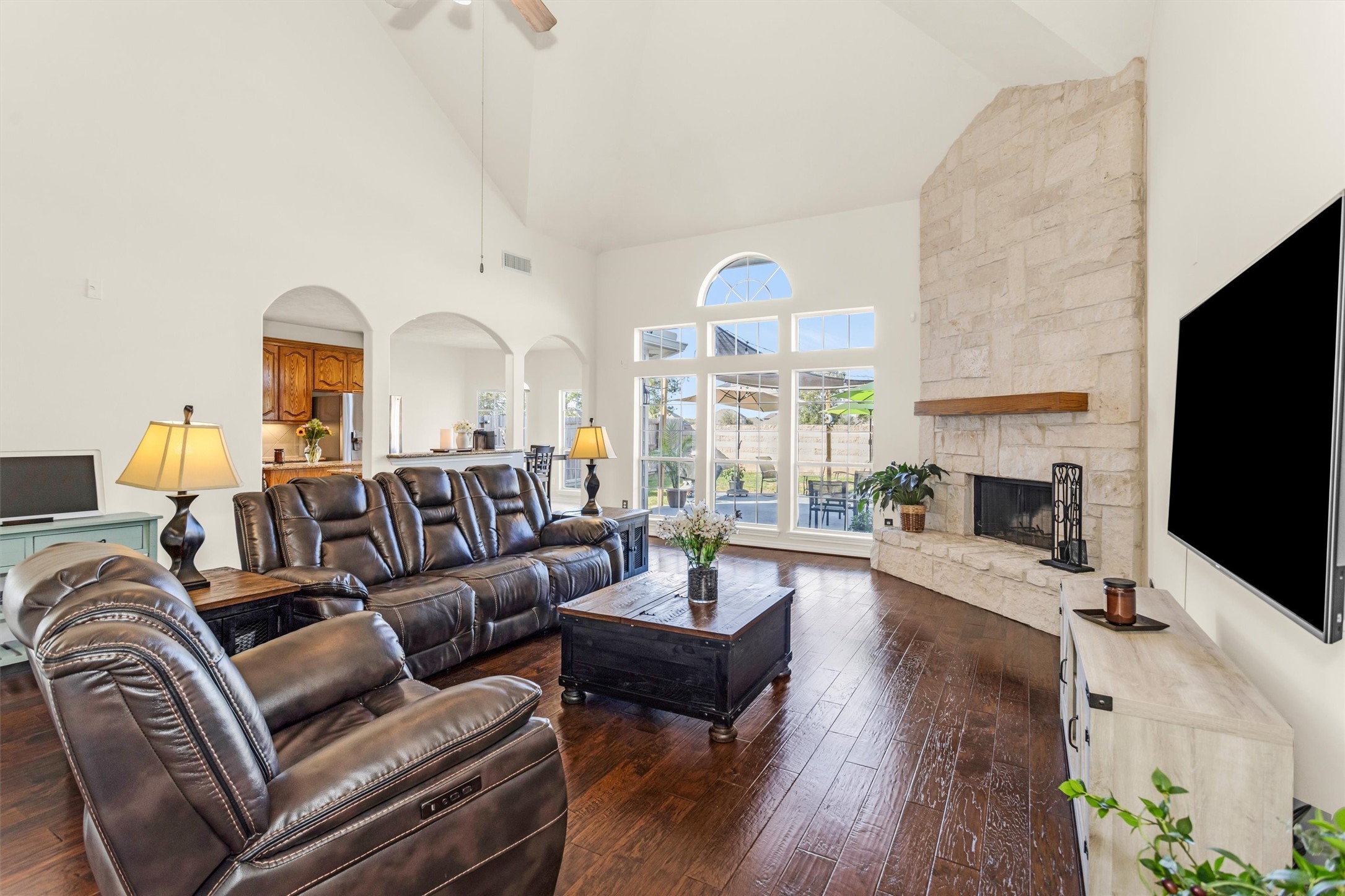 3211 Burton Ridge Drive Spring, TX 77386 - Photo 14 of 49 a living room with furniture fireplace and flat screen tv