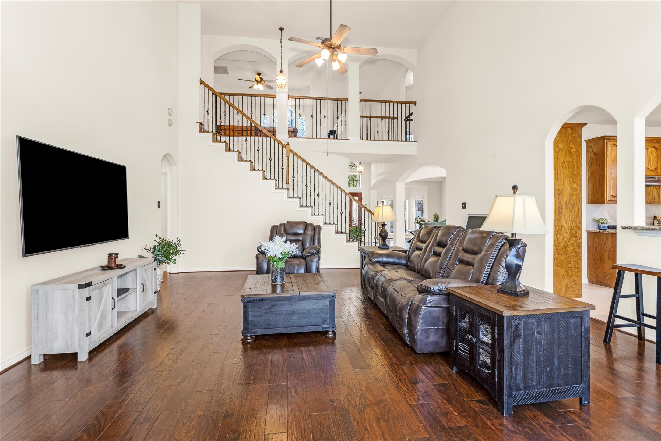 3211 Burton Ridge Drive Spring, TX 77386 - Photo 15 of 49 a living room with furniture and a flat screen tv