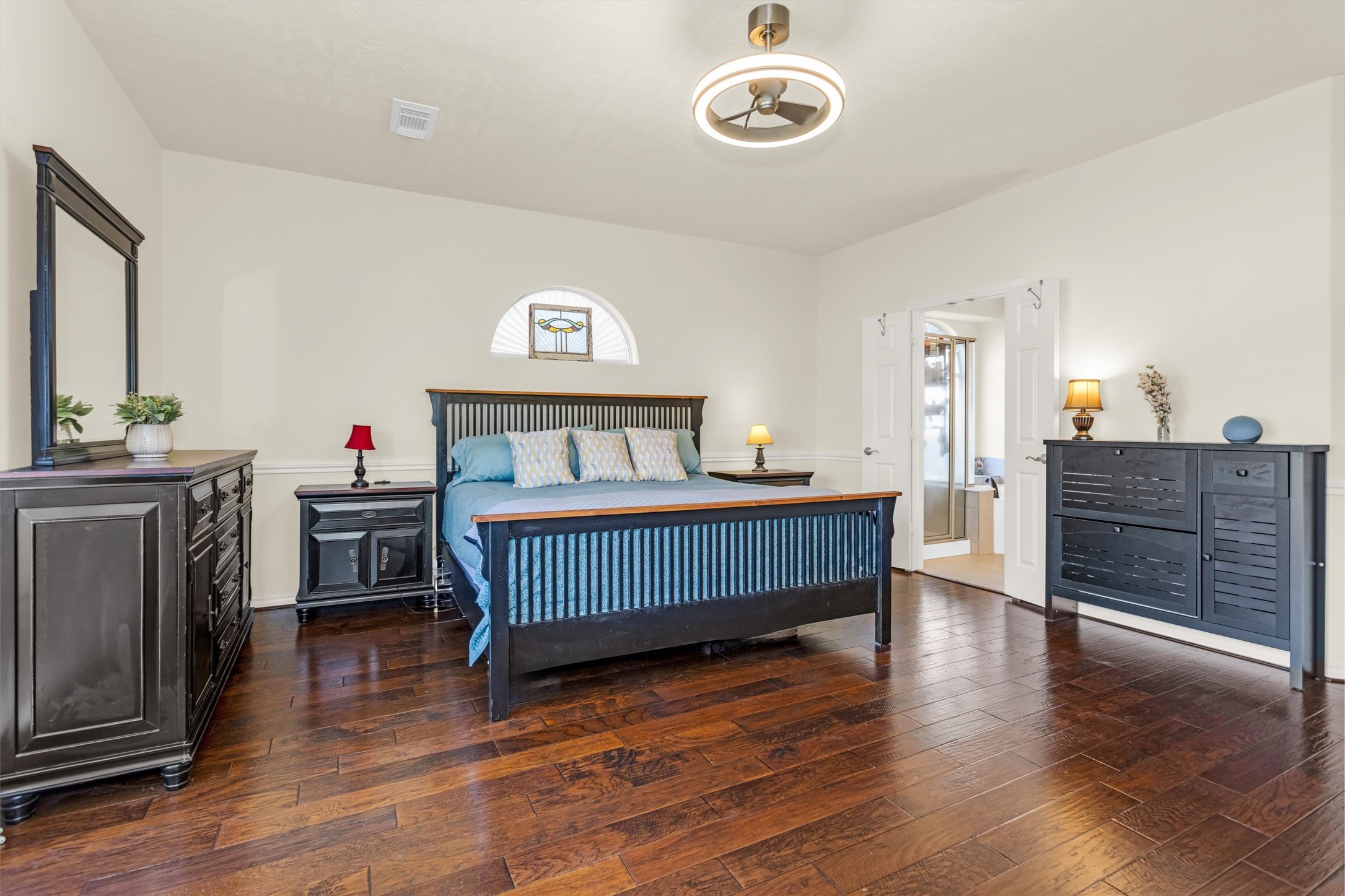 3211 Burton Ridge Drive Spring, TX 77386 - Photo 25 of 49 a bedroom with a bed and a baby crib