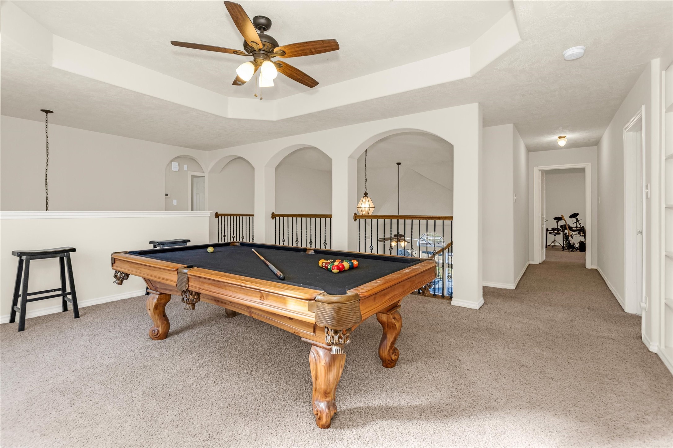 3211 Burton Ridge Drive Spring, TX 77386 - Photo 31 of 49 a bedroom with furniture and a chandelier fan