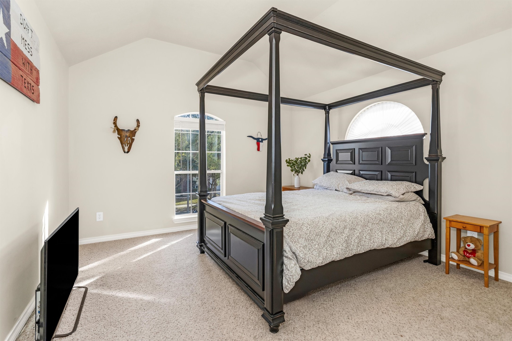 3211 Burton Ridge Drive Spring, TX 77386 - Photo 33 of 49 a bed room with a bed and a mirror