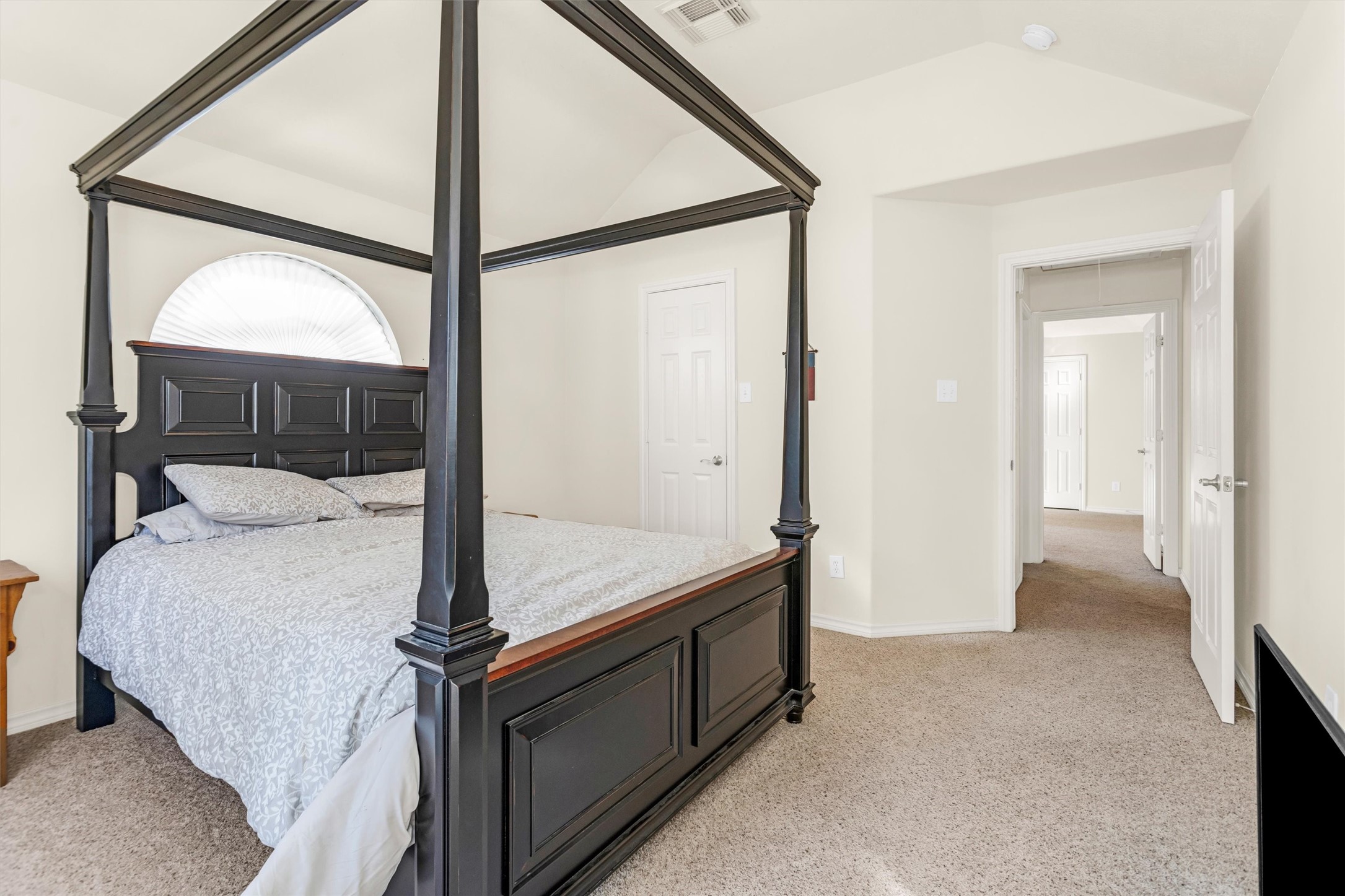 3211 Burton Ridge Drive Spring, TX 77386 - Photo 34 of 49 a bedroom with a bed and a mirror