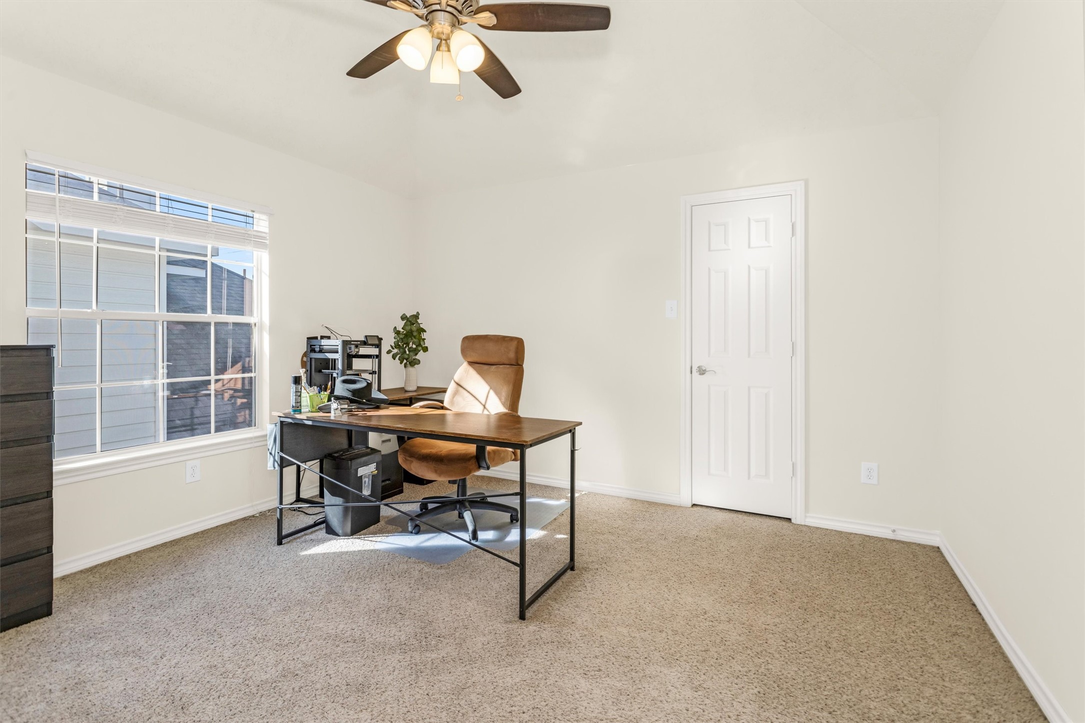 3211 Burton Ridge Drive Spring, TX 77386 - Photo 36 of 49 a view of a workspace with furniture and a window