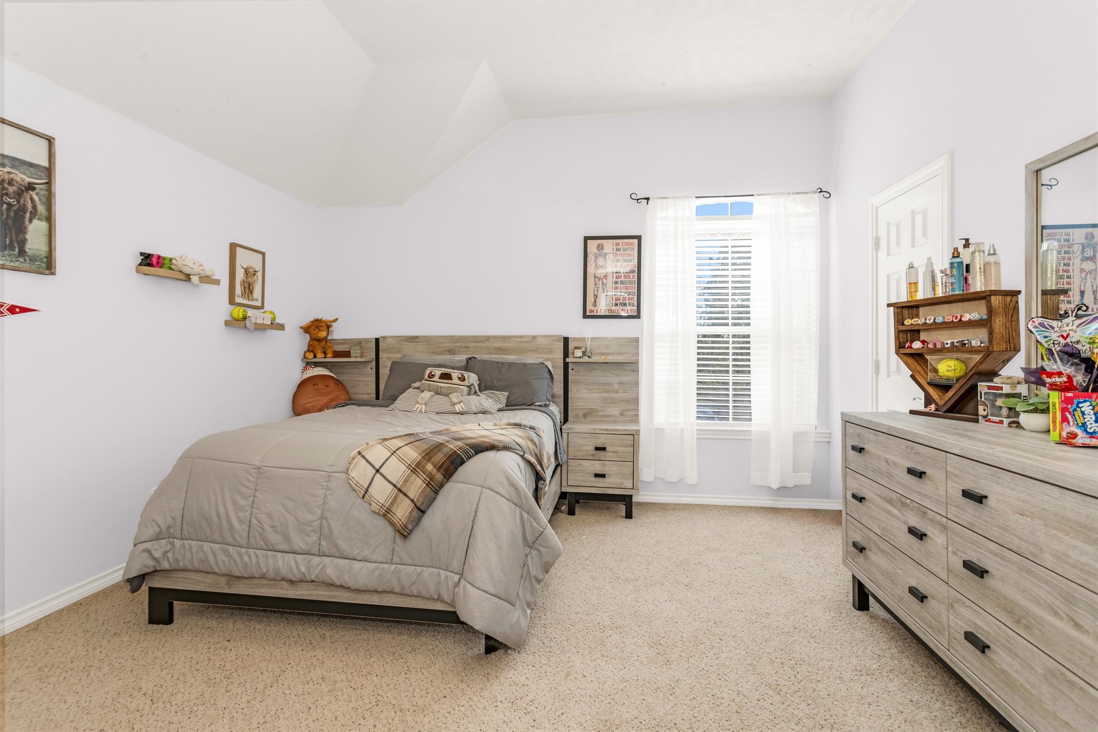 3211 Burton Ridge Drive Spring, TX 77386 - Photo 39 of 49 a bedroom with a bed and a window