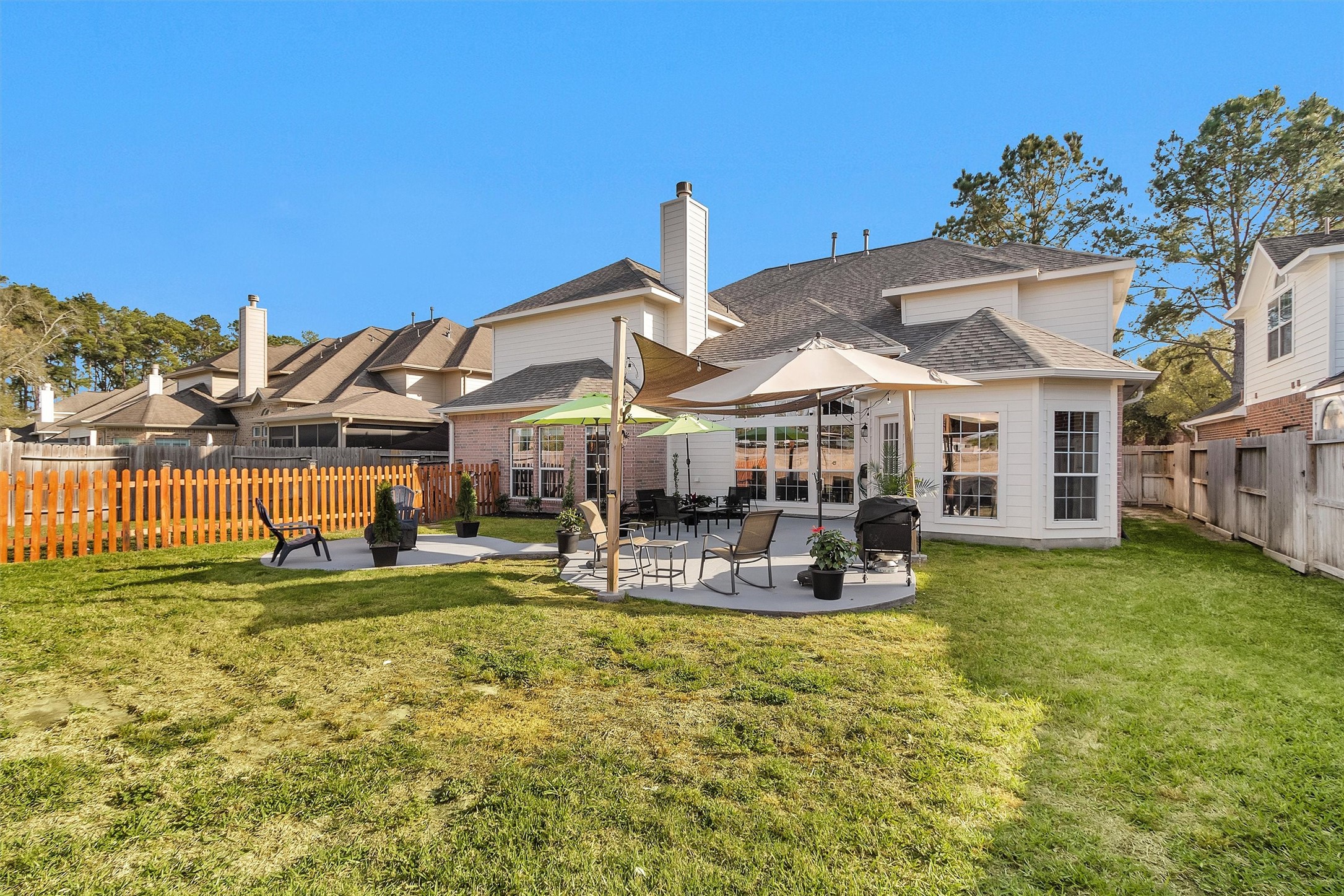 3211 Burton Ridge Drive Spring, TX 77386 - Photo 48 of 49 a view of a house with swimming pool and sitting area