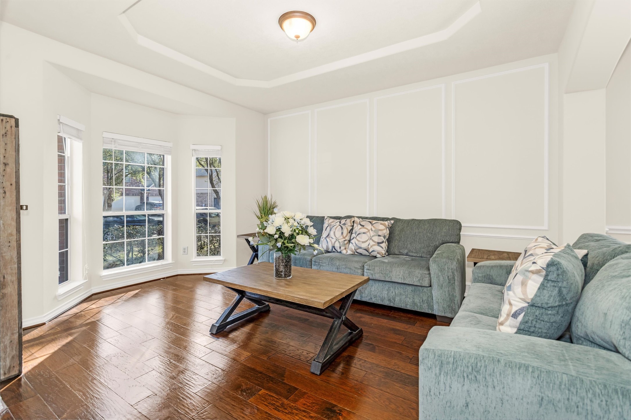 3211 Burton Ridge Drive Spring, TX 77386 - Photo 5 of 49 a living room with furniture and wooden floor