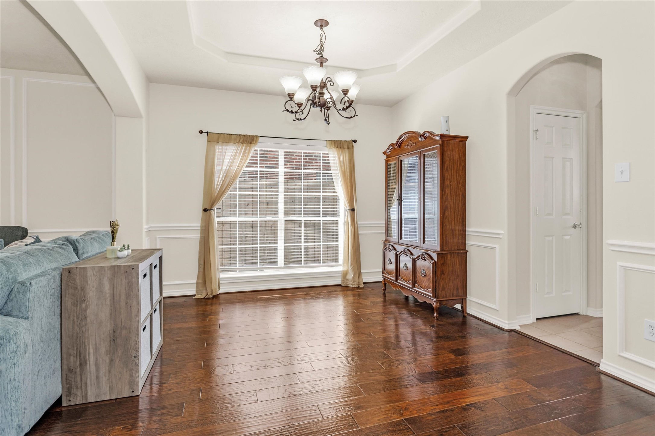 3211 Burton Ridge Drive Spring, TX 77386 - Photo 8 of 49 a view of an empty room with wooden floor and a window