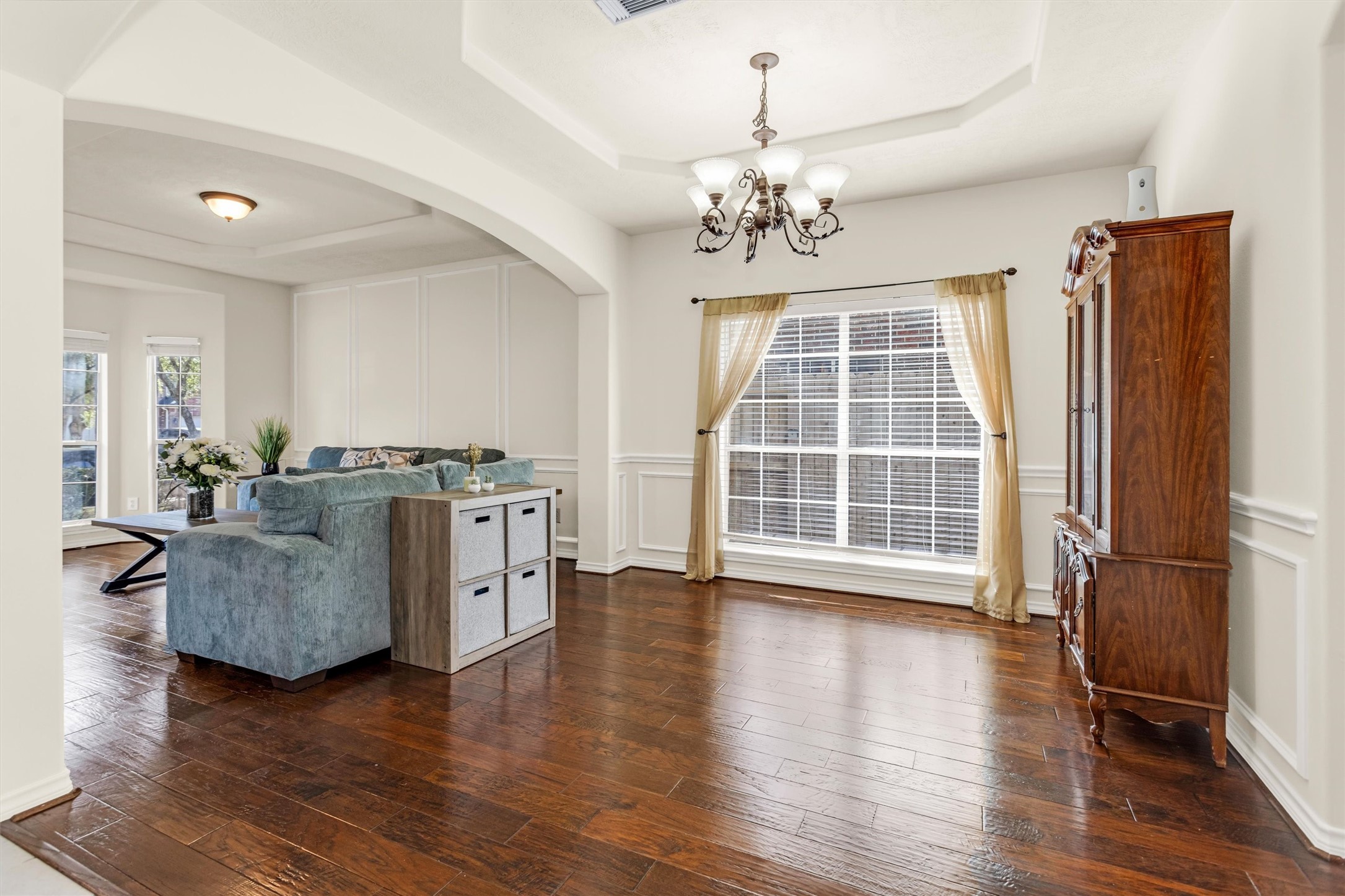 3211 Burton Ridge Drive Spring, TX 77386 - Photo 9 of 49 a view of a livingroom with furniture wooden floor and window