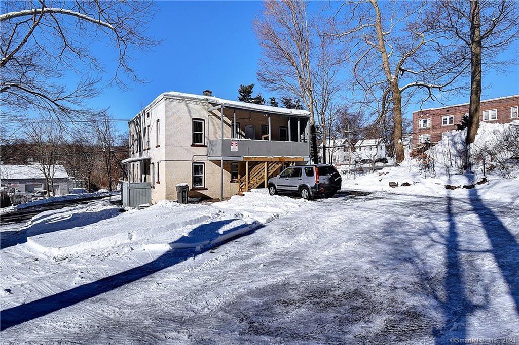 a view of a house with a snow