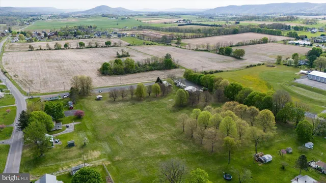 an aerial view of residential house with outdoor space