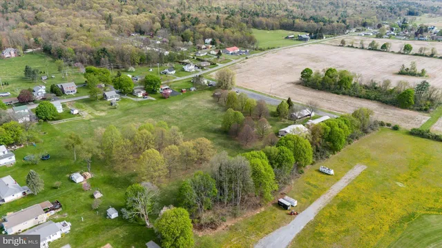 a view of a lake with a yard