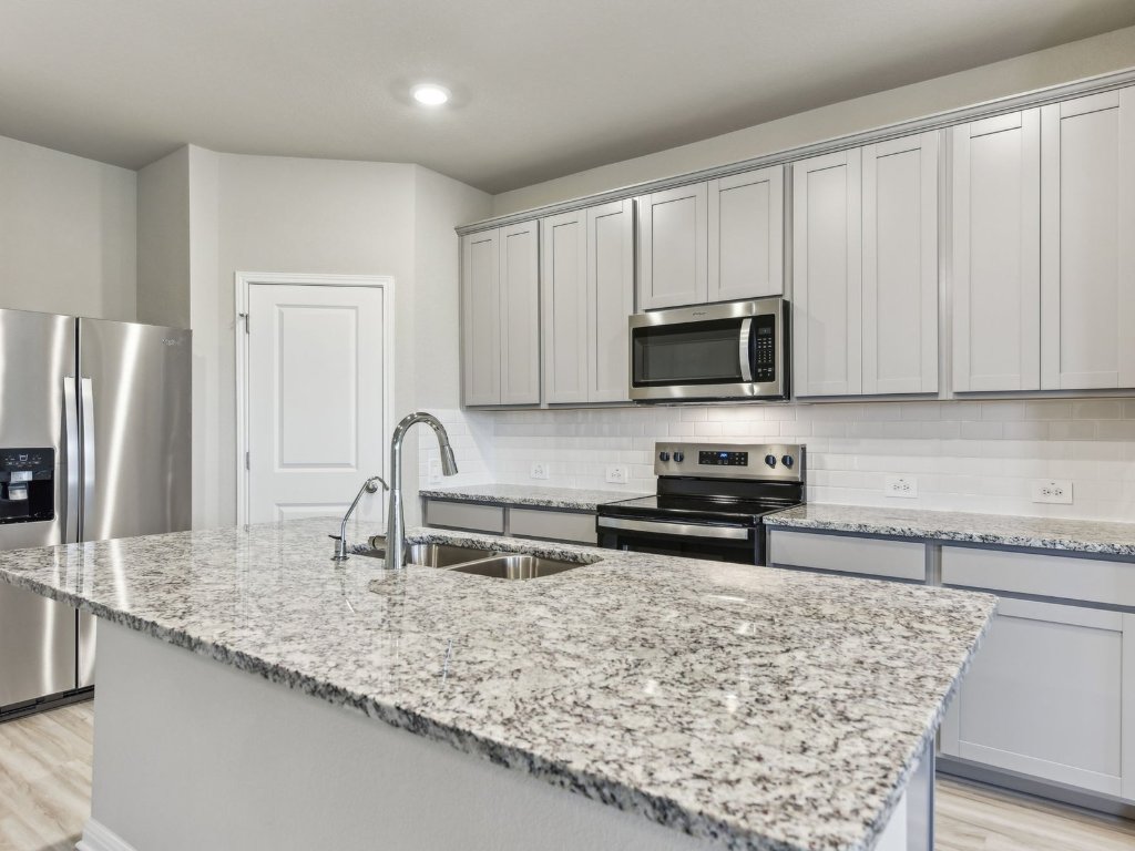 100 Honey Bee Road Jarrell, TX 76537 - Photo 11 of 17 Photo is not of the actual home, but is an inspirational photo of builder’s model home and may depict options, furnishings, and/or decorator features that are not included