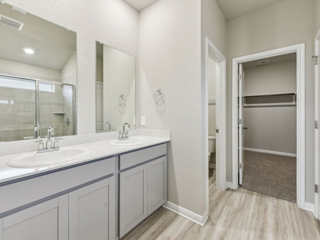 100 Honey Bee Road Jarrell, TX 76537 - Photo 13 of 17 Photo is not of the actual home, but is an inspirational photo of builder’s model home and may depict options, furnishings, and/or decorator features that are not included