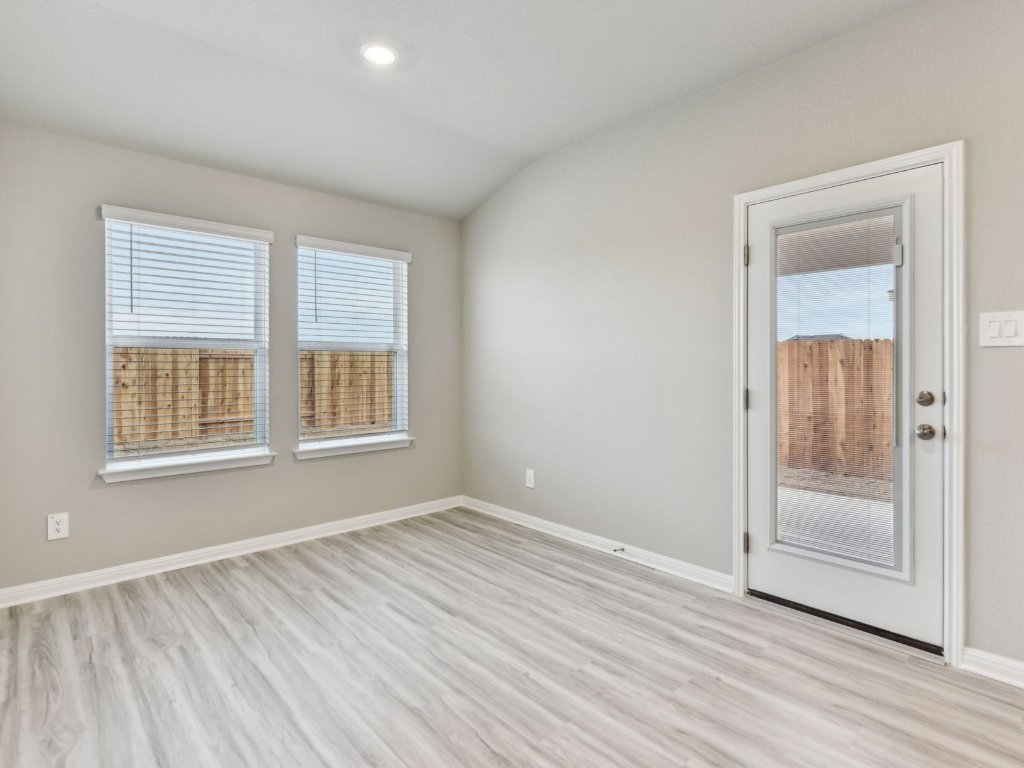 100 Honey Bee Road Jarrell, TX 76537 - Photo 9 of 17 Photo is not of the actual home, but is an inspirational photo of builder’s model home and may depict options, furnishings, and/or decorator features that are not included