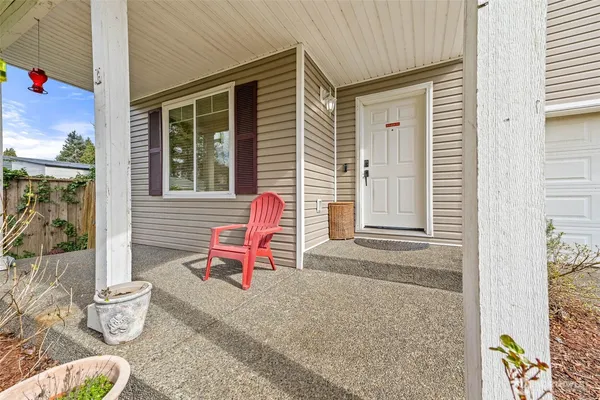 a bench that is in front of a house