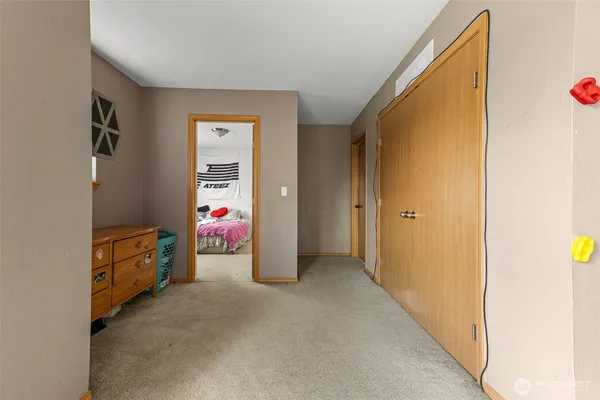 a view of a hallway view with staircase